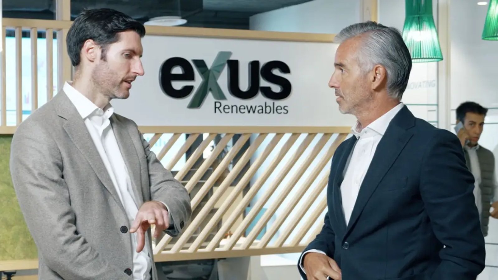 Exus Renewables employees discussing messaging and positioning Exus Renewables employees discussing messaging and positioning